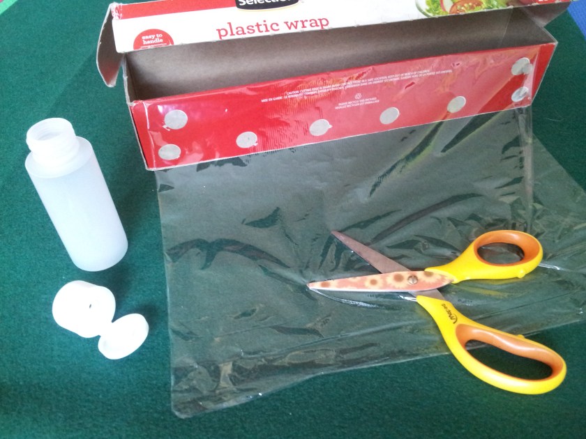 Take ordinary plastic wrap and cut a small piece of it.